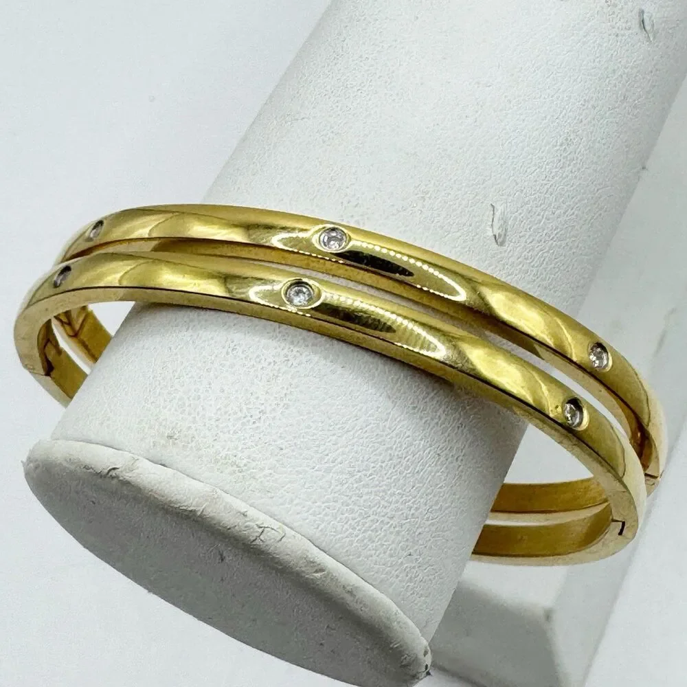 2 Gold Tone Bangle Bracelets With Rhinestone Details Stainless Steel Hinged